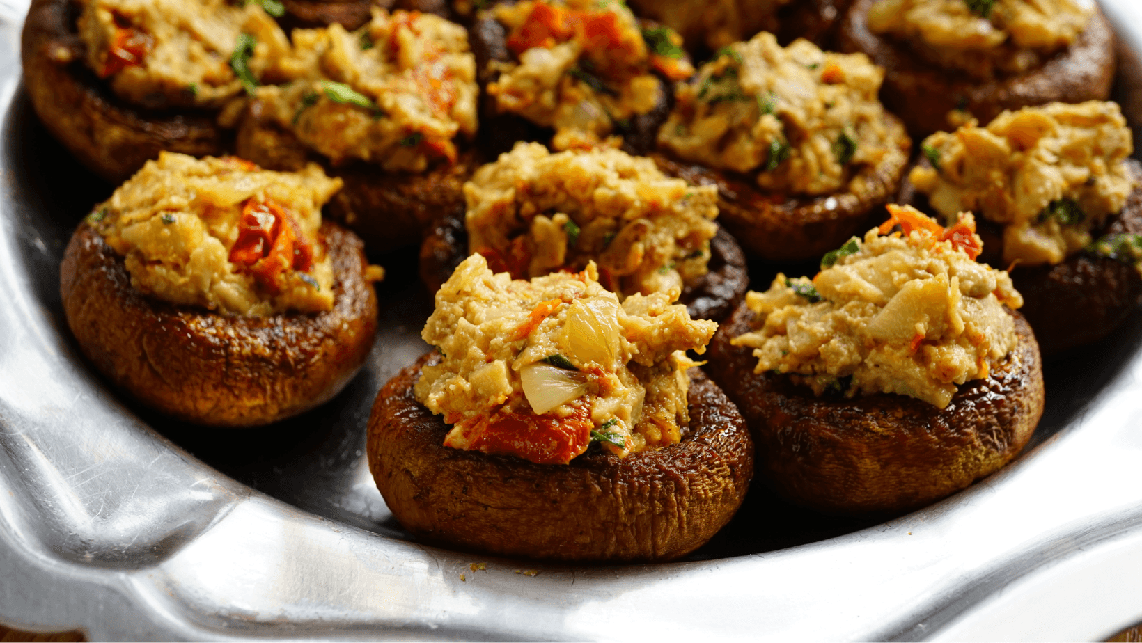 Platter of stuffed mushroom caps with vegan stuffing