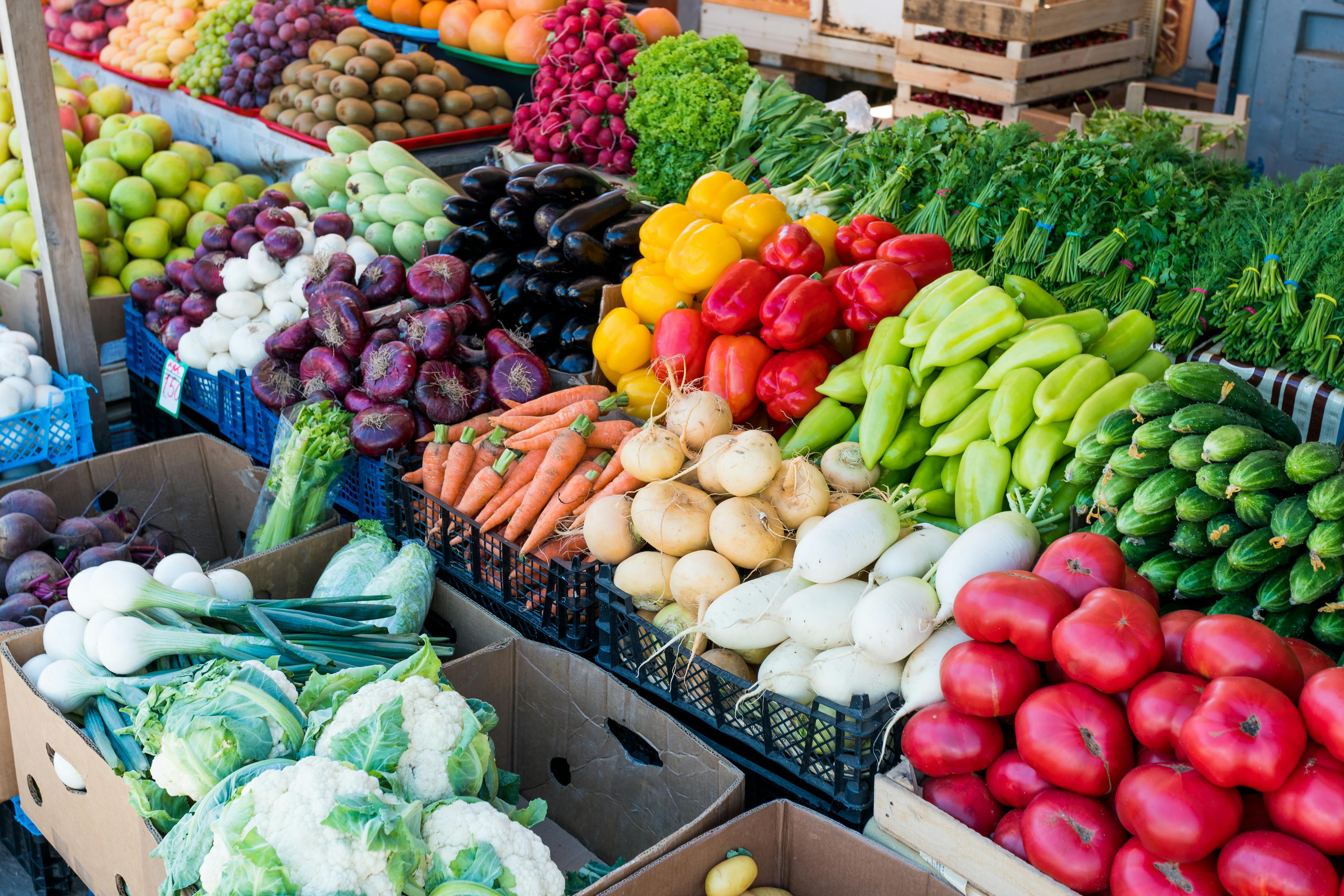 Colorful Fruits & Vegetables in a farmers' market stand 